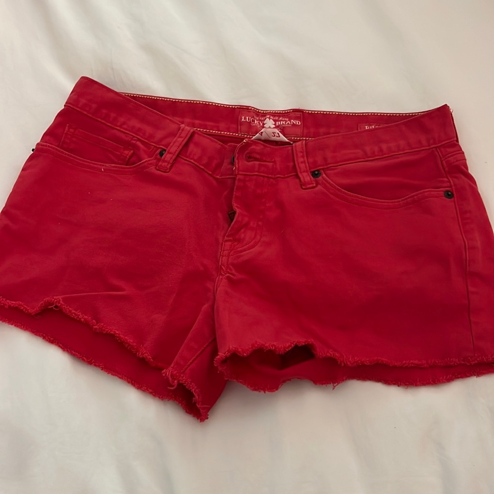 Low rise Lucky Brand red cut off jean shorts